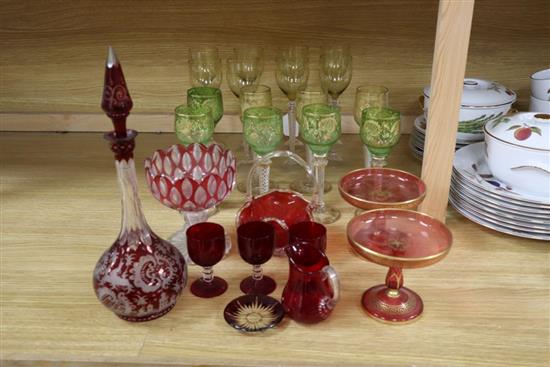 A Bohemian ruby flash glass decanter and stopper, cranberry glass, including a pair of tazzas, a collection of hock glasses, etc.